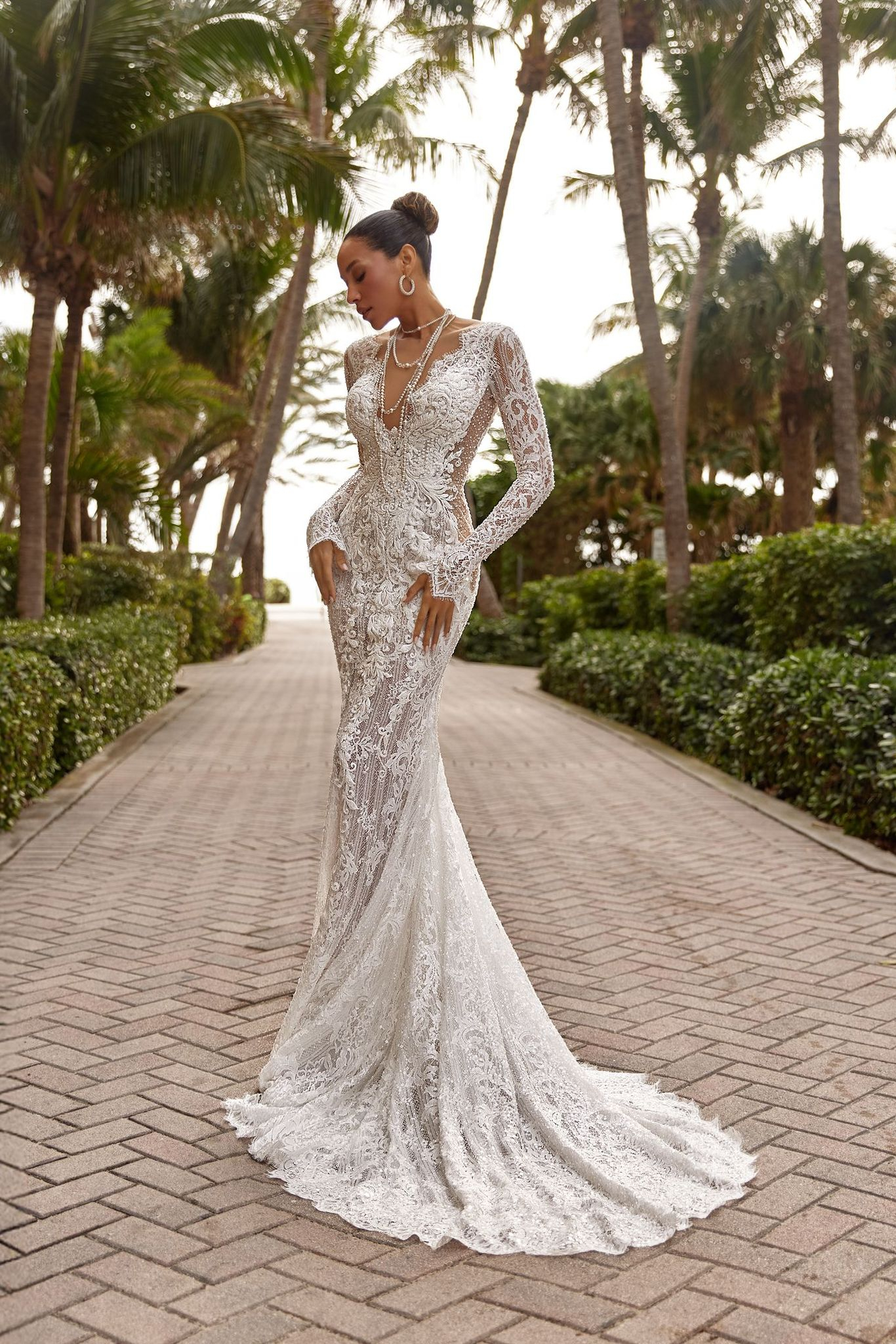wedding dress Liora by OKSANA MUKHA Liora bridal look: fitted lace with hidden belt and graceful, flowing embellishments