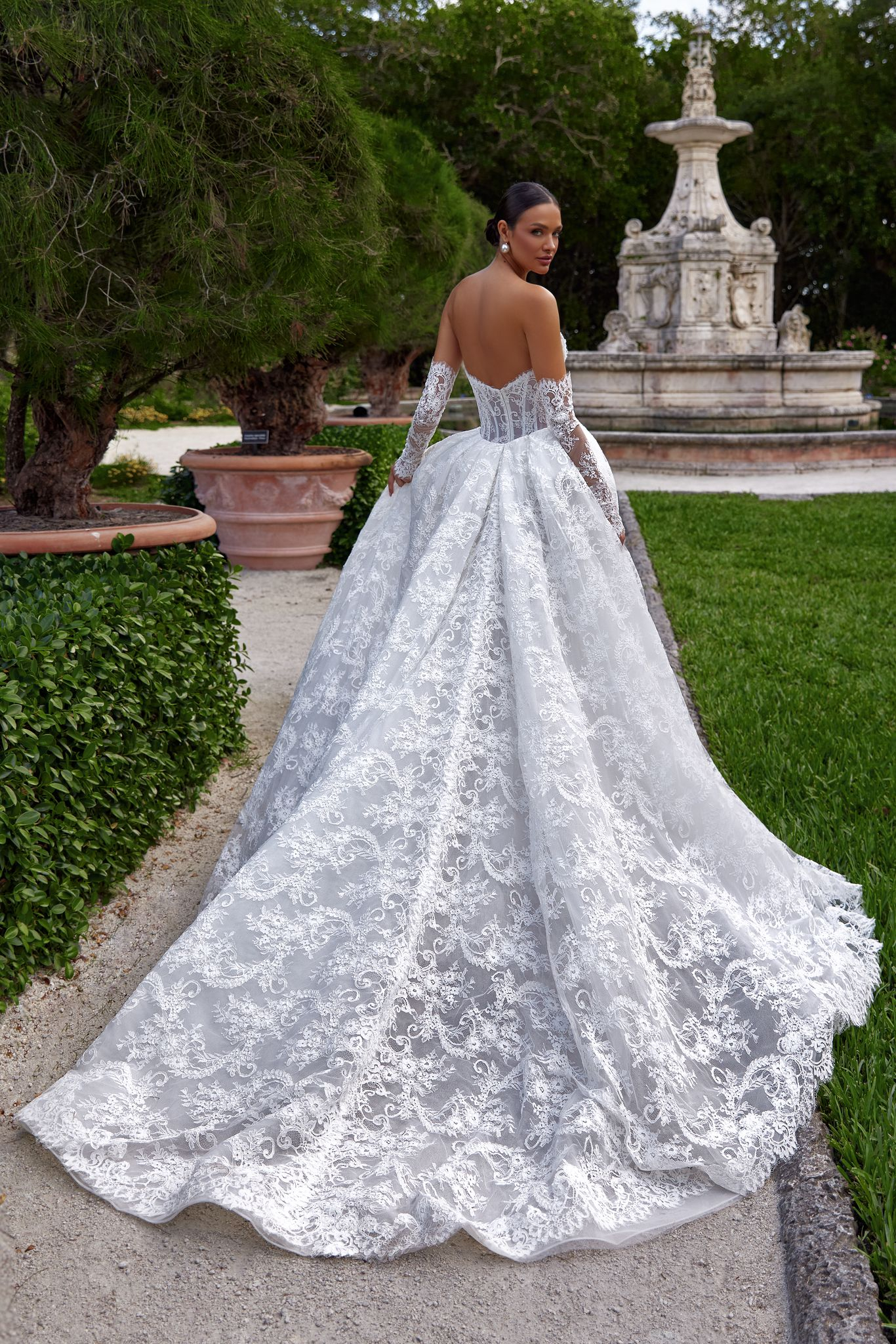 wedding dress Bella by OKSANA MUKHA Bella gown: luxury design with detachable train, lace trim, and radiant embellishments