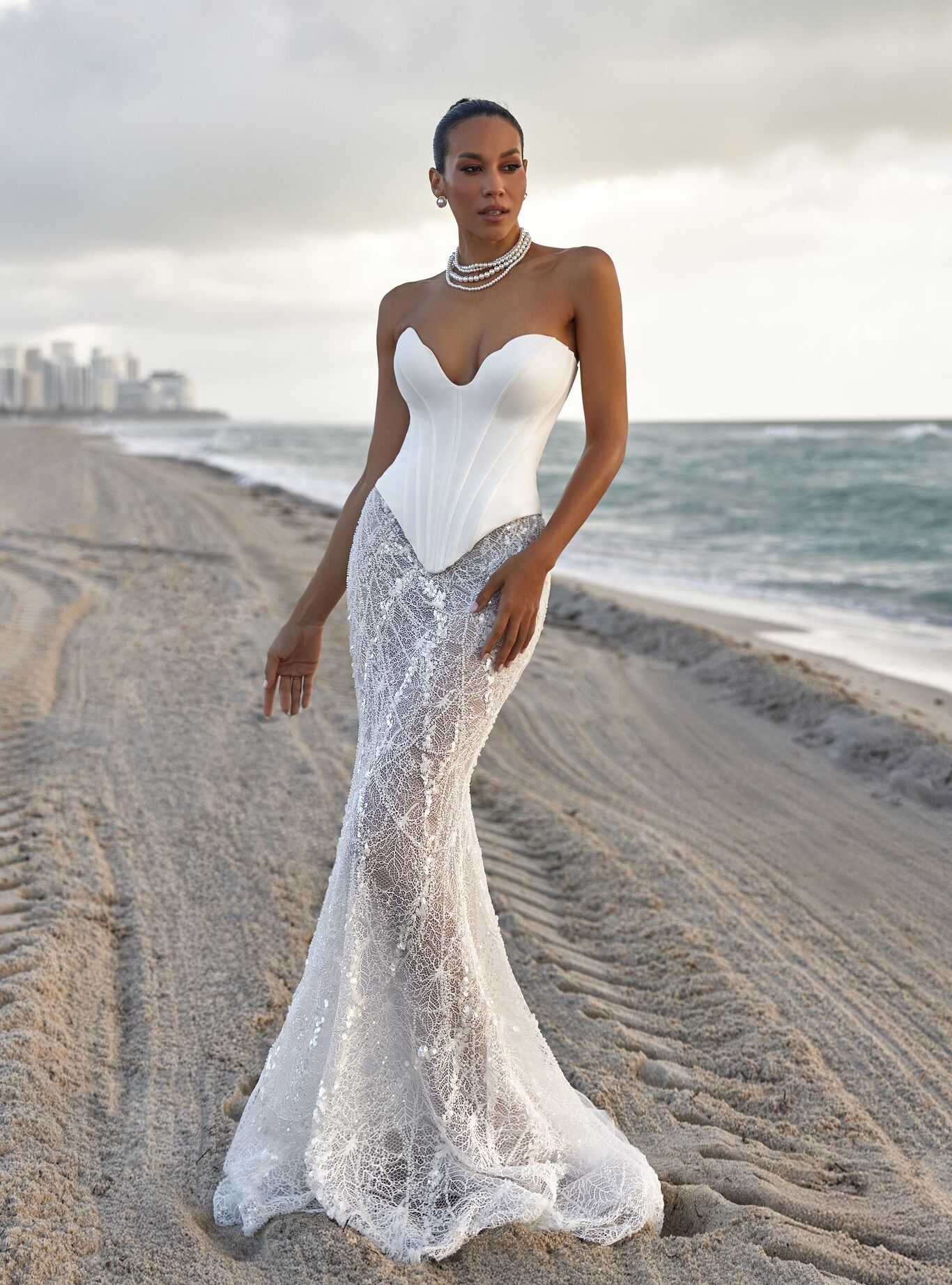wedding dress Caprice by OKSANA MUKHA Elegant Caprice bridal gown with a structured corset and magical light-catching details.
