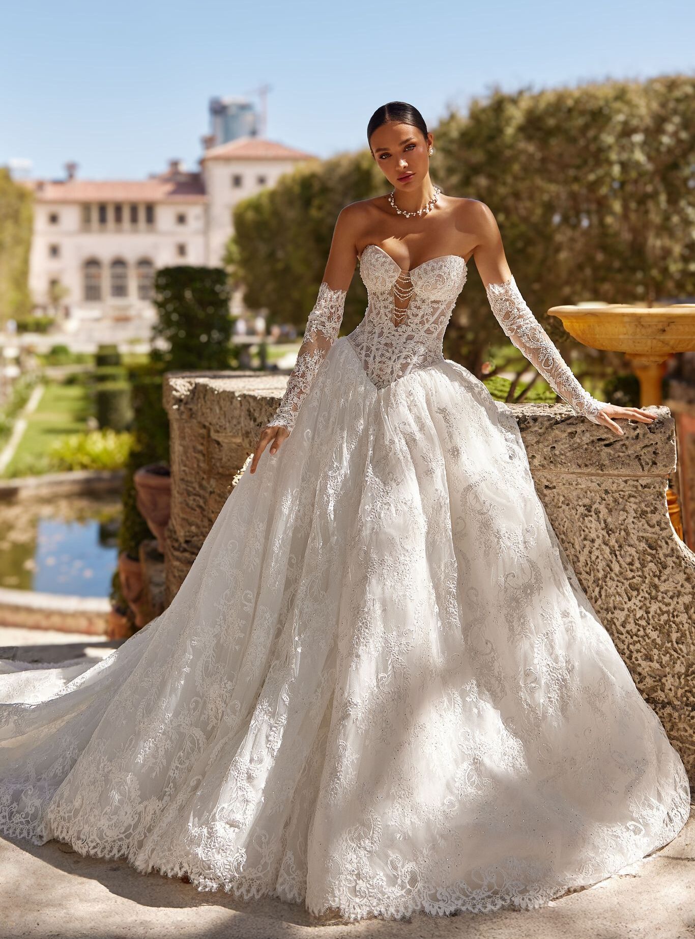 wedding dress Rosabelle by OKSANA MUKHA Rosabelle gown: fairy-tale silhouette with lace, tulle, and 9,300 sparkling crystals