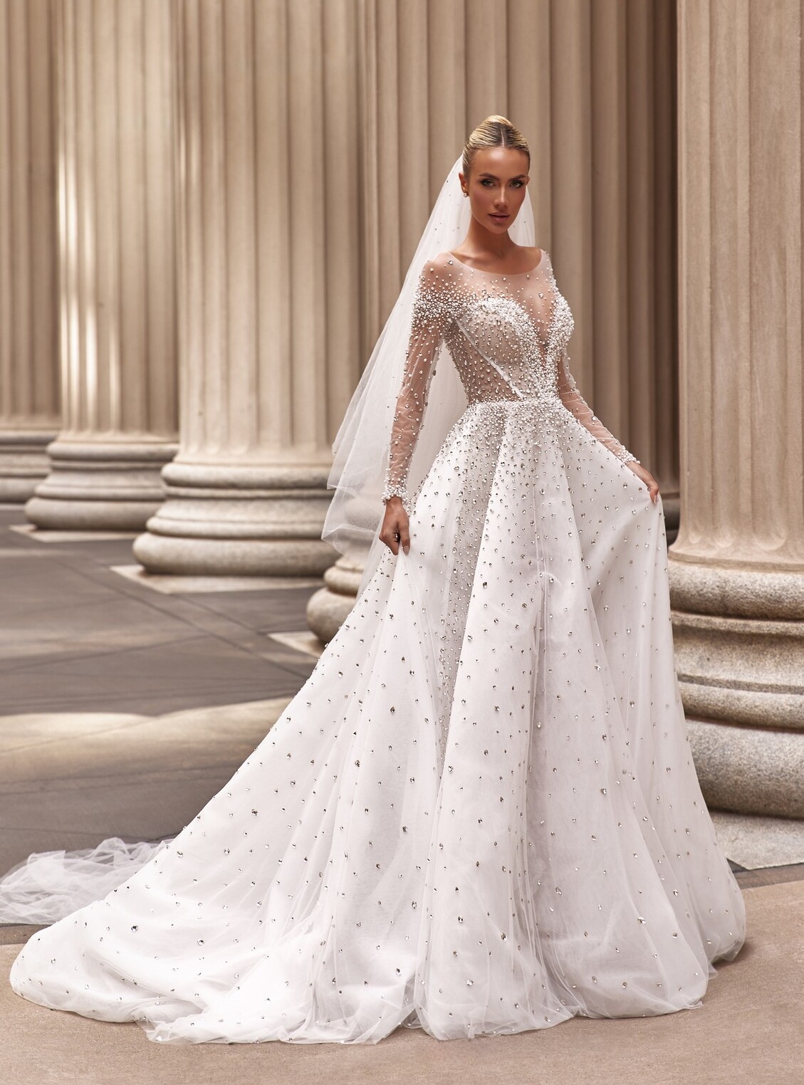 wedding dress Elle by OKSANA MUKHA Elle gown: classic A-line with lace appliqués, hand-embroidered flowers, and 900 pearls