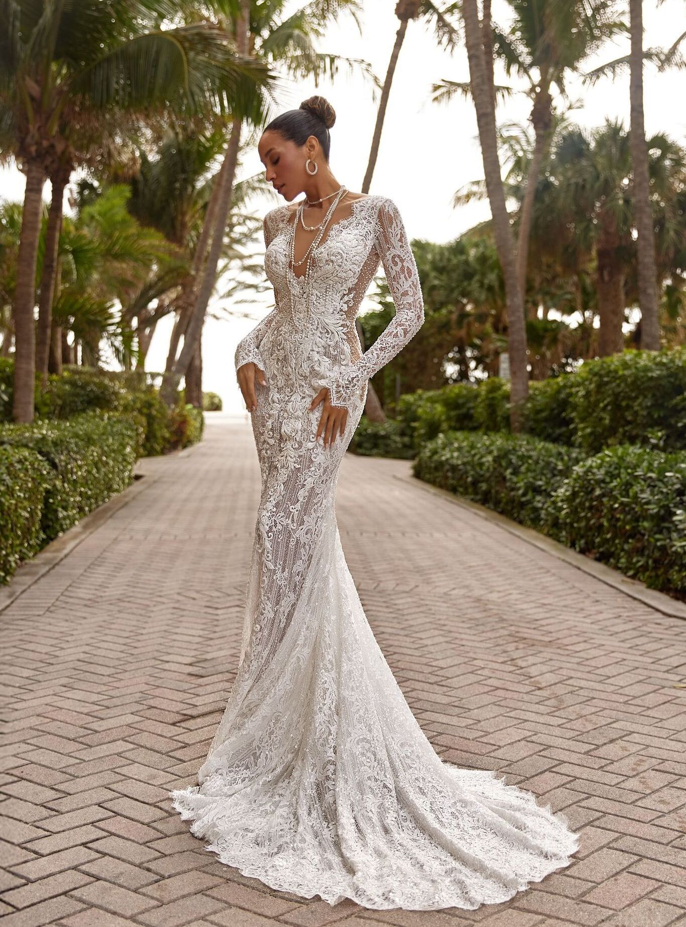 wedding dress Liora by OKSANA MUKHA Liora bridal look: fitted lace with hidden belt and graceful, flowing embellishments