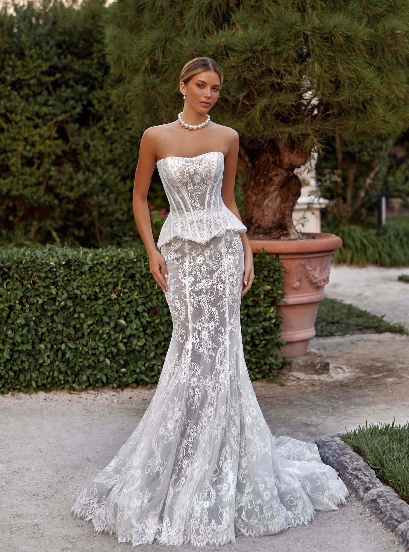 wedding dress Felicia by OKSANA MUKHA Felicia dress: soft silhouette with delicate lace, peplum waist, and graceful charm
